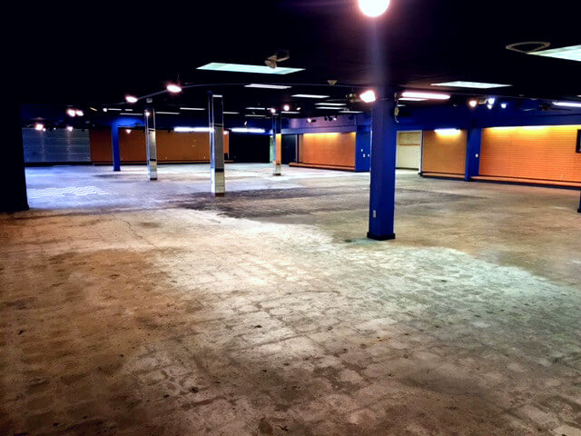 Motorcycle Dealership Showroom Floor (After Floor Tile Removal) and Before Epoxy